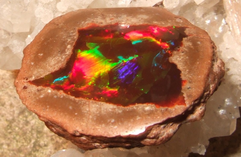fire opal in rhyolite geode.JPG