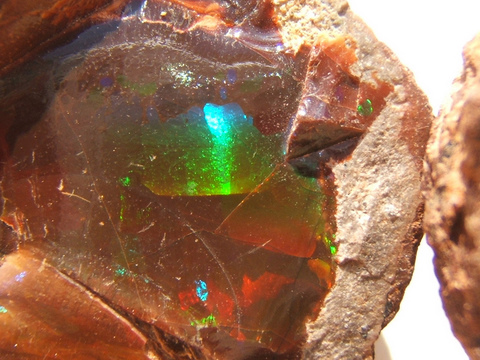 Chocolate caramel-colored opal in the geode3.jpg